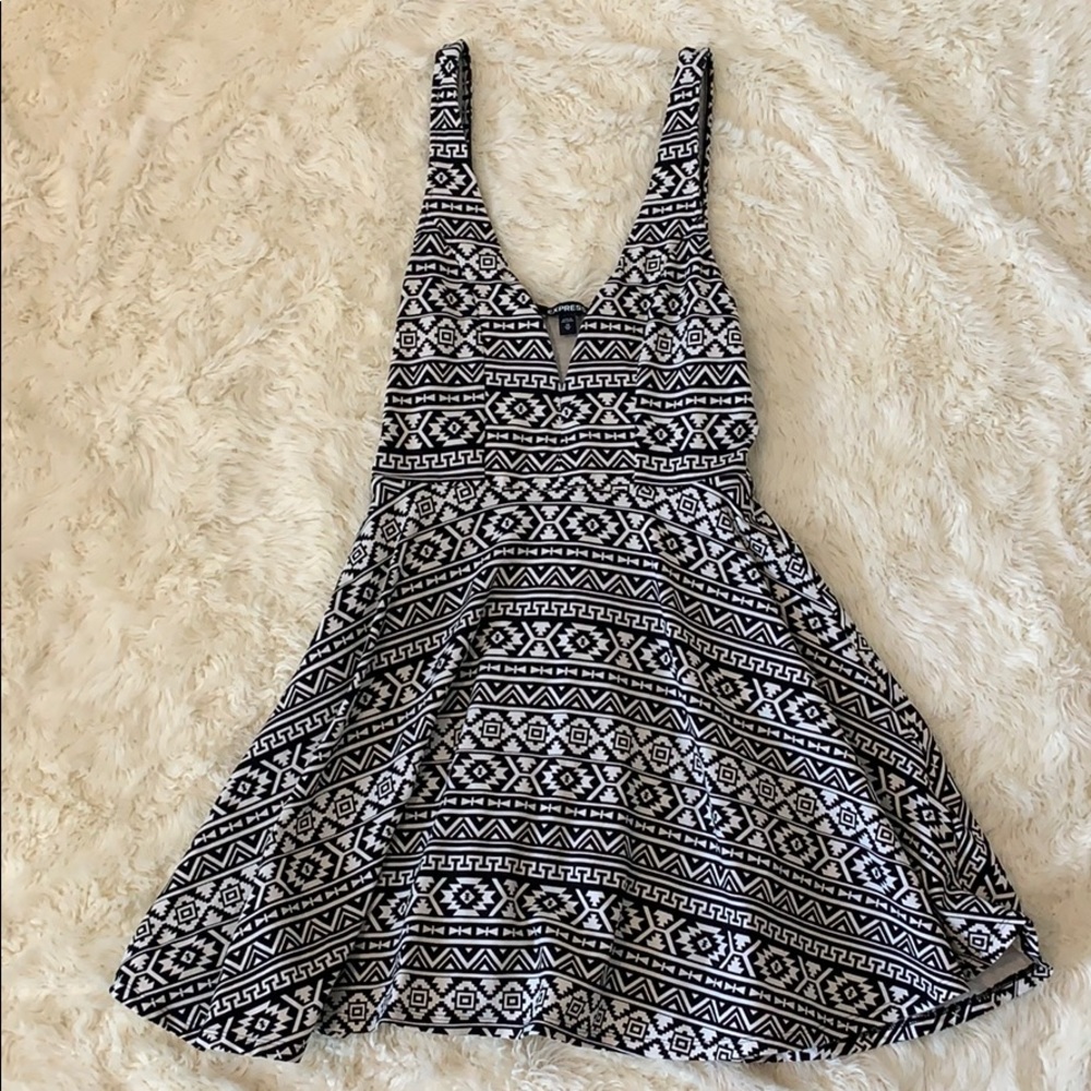 Black and white dress with hidden shorts.